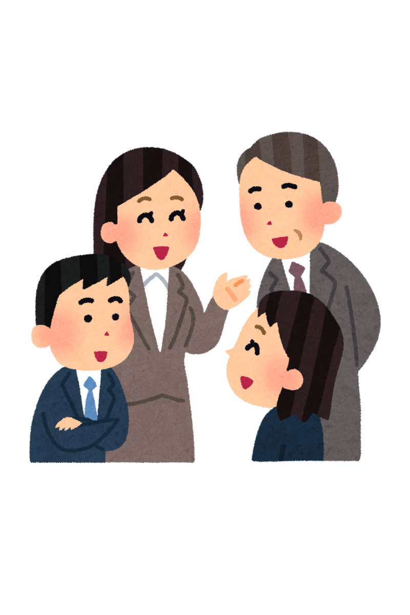 事務所で談笑している社員たち